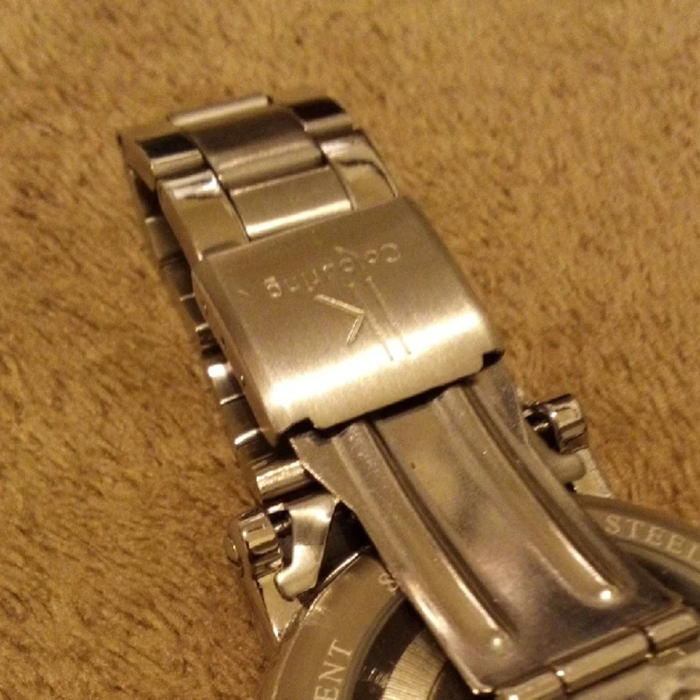 Elegant Silver Watch with Blue Details